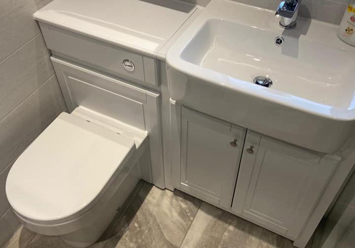 White sink and toilet unit