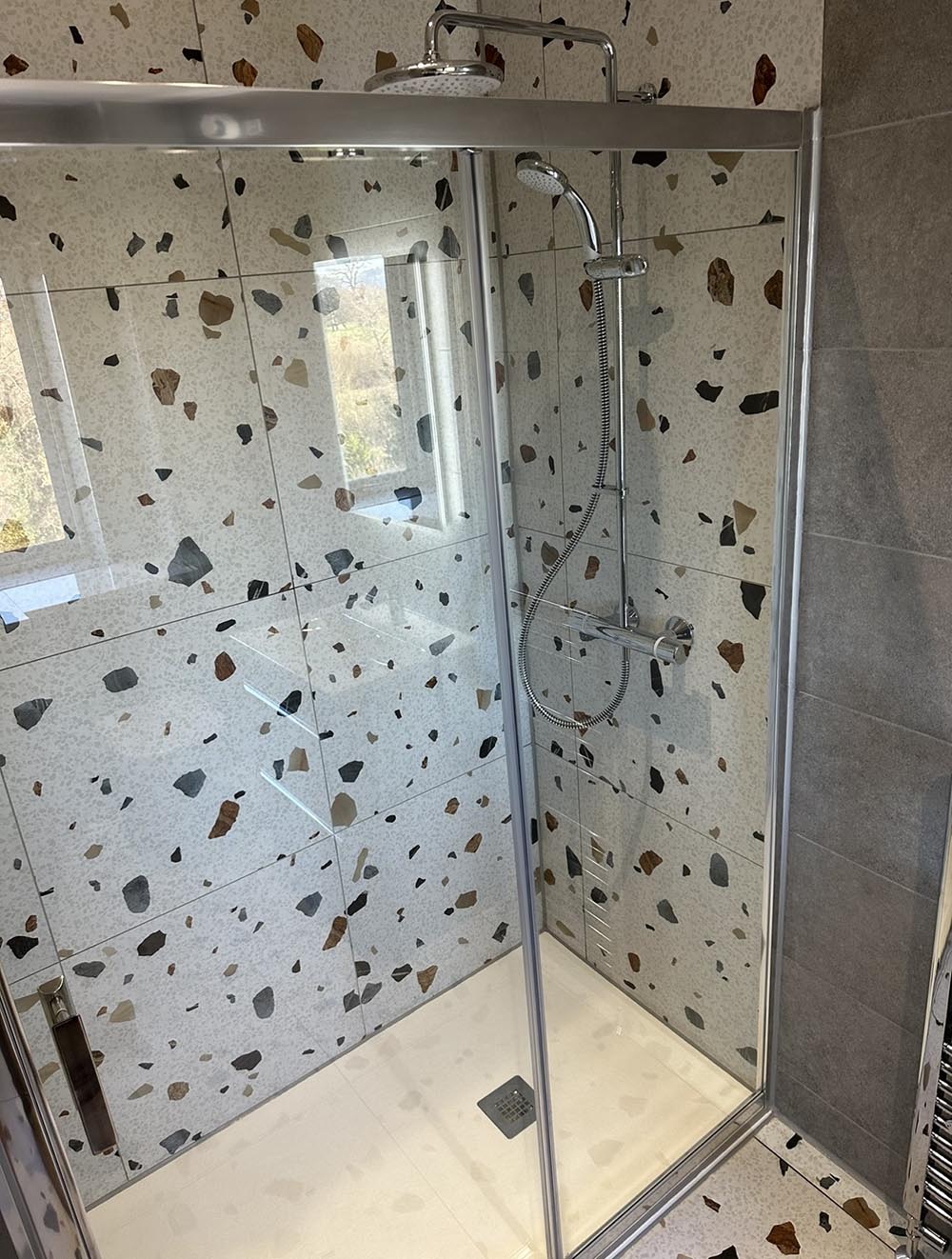 Patterned wall tiles in a shower